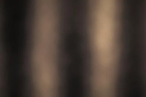 Dark bronze metallic texture with vertical light streaks offers a sophistic.. Stock Photos