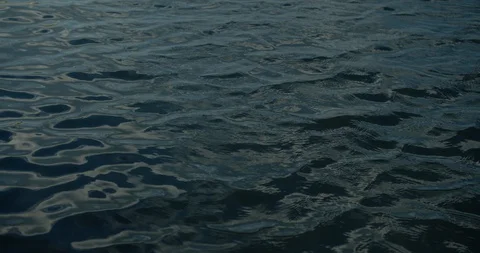 Dark brooding waters with small calm waves 動画素材 128329721
