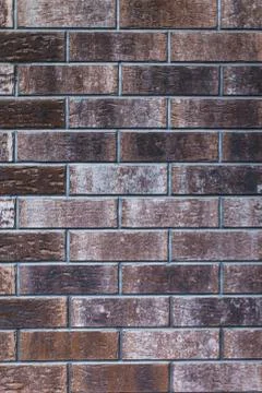 Dark broun brick wall background, texture. Vertical Stock Photos