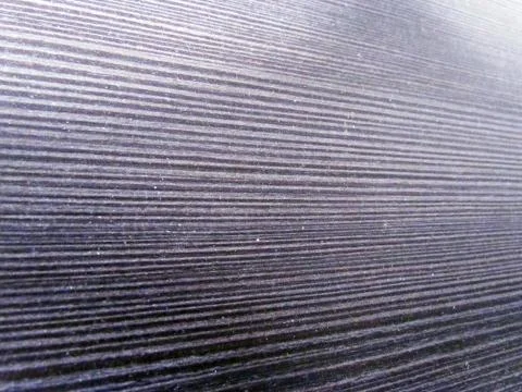 Dark brown background with perforation Stock Photos
