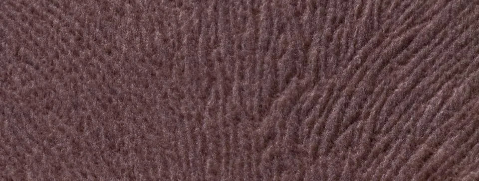 Dark brown background from soft fluffy textile material macro. Texture of c.. Stock Photos