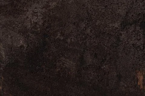 Dark brown bumpy rough surface, iron background with rust 스톡 사진