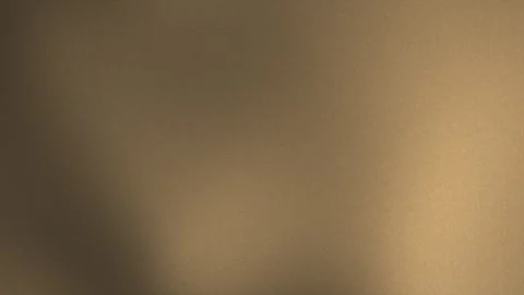 Dark brown gradient background with subtle noise Vídeo Stock 335680654