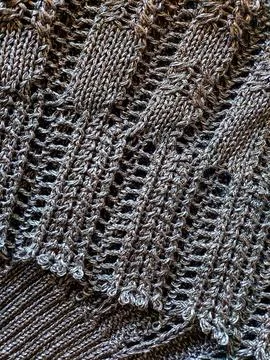 Dark Brown Knitted Wool Texture with Open Lace Pattern Stock Photos