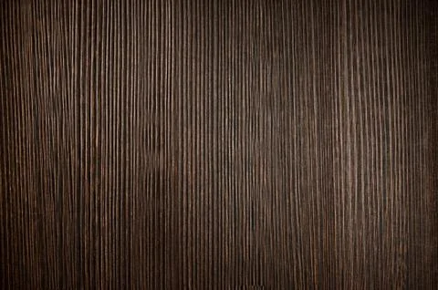 Dark brown laminate with rough surface imitation wood Stock Photos