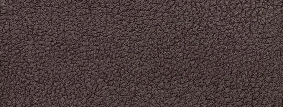 Dark brown leather texture background with fine grain, macro surface. Uphol.. Stock Illustration