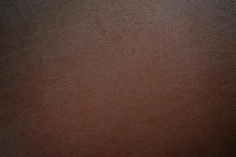 Dark brown leather texture can be use as background Stock Photos