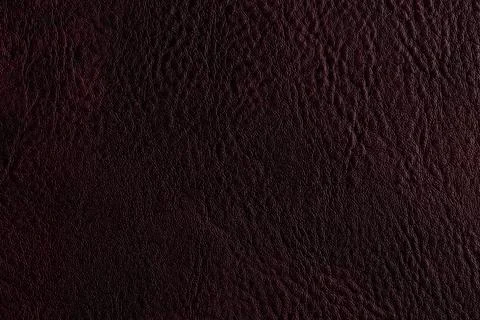 Dark brown leather texture on a surface suitable for furniture or craft pro.. Stock Photos