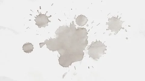 Dark brown liquid coffee stain spreading on white paper Video stock 335495323