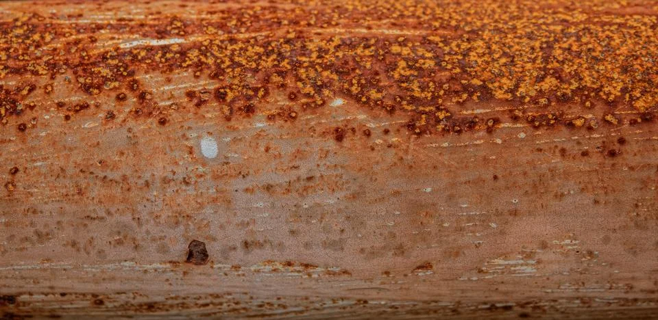 Dark brown rust on metal background Stock Photos