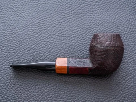 Dark Brown Rusticated Army or Bulldog Tobacco Pipe Stock Photos