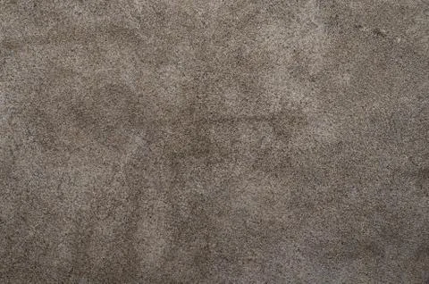 Dark brown suede soft leather as texture background. Close up leather texture Stock Photos
