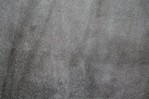 Dark brown suede soft leather as texture background. Close up leather texture Stock Photos