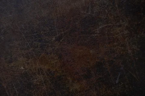 Dark brown surface made of artificial leather with scratches. Background with Foto stock