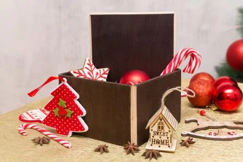Dark brown wooden copy space in Christmas gift composition with festive Stock Photos
