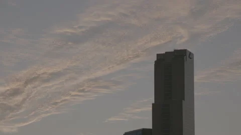 Dark Building Against Cirrocumulus Clouds Stock Footage 145236177