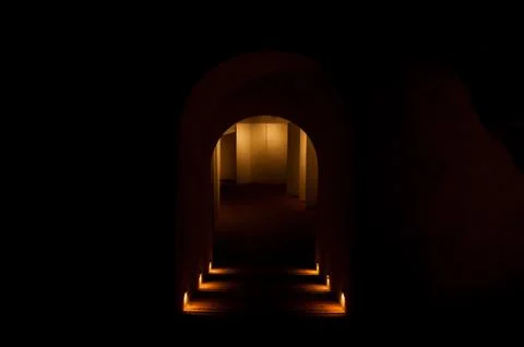 Dark cave in the medieval castle Stock Photos