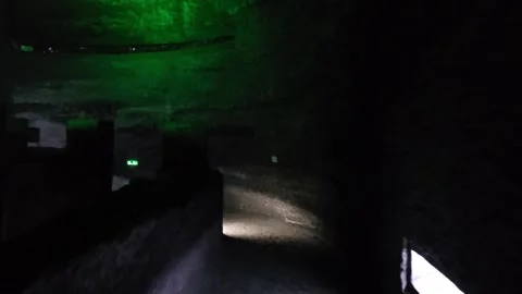 Dark Cavern Passage With Green Glow and Floor Lights, Catedral de Sal, Colombia Stock-Footage 331526244
