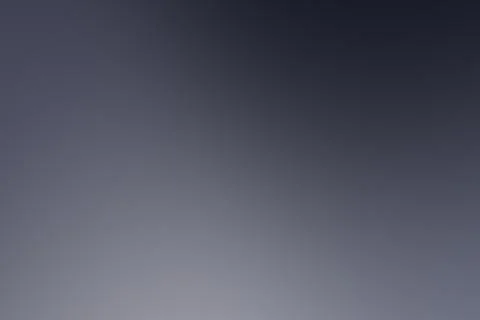 A dark charcoal abstract gradient surrounds a subtle soft gray glow near th.. Illustrazione stock