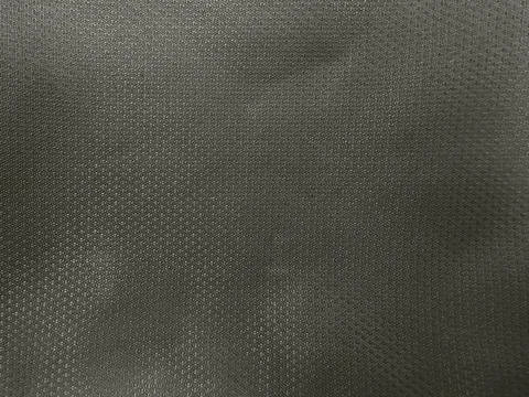 Dark charcoal gray technical fabric texture with intricate micro woven patter Foto stock