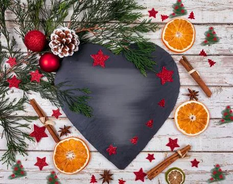 A dark cheese platter with copy space for text in Christmas decor Stock Photos