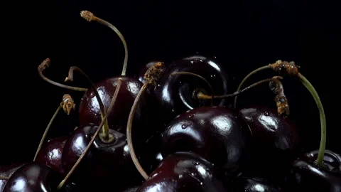 Dark cherries on a plate Stock Footage 138266300