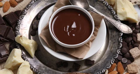 Dark chocolate and cocoa beans, cacao powder, cocoa butter culinary background,  Stock Footage 171848929