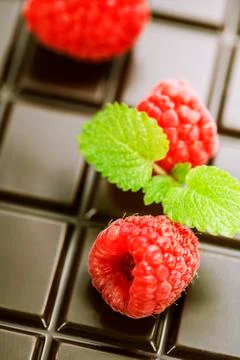 Dark chocolate bar with raspberry Stock Photos