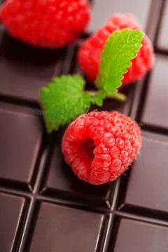 Dark chocolate bar with raspberry Stock Photos