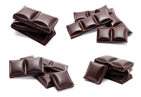 Dark chocolate bars stack with crumbs isolated Stock Photos