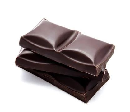 Dark chocolate bars stack with crumbs isolated Stock Photos