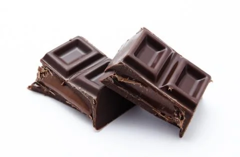 Dark chocolate bars stack isolated on a white Stock Photos
