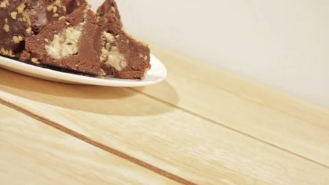 Dark chocolate biscuits with delicate filling Stock Footage 71379233