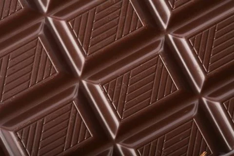 Dark chocolate block background Stock Photos