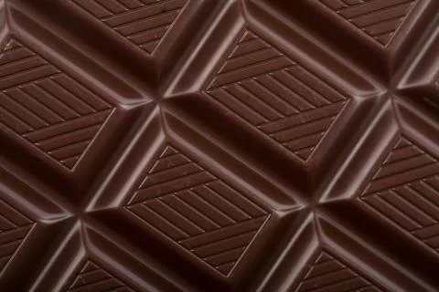 Dark chocolate block background Stock Photos