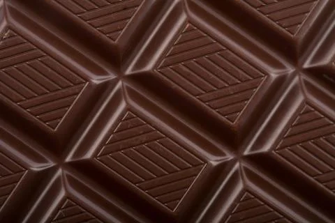 Dark chocolate block background Stock Photos