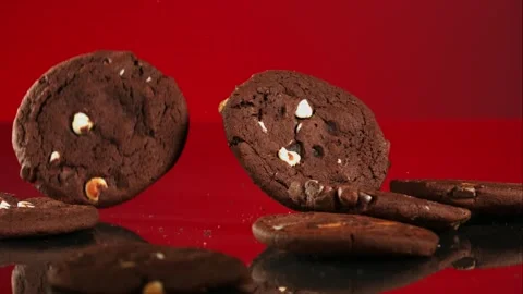 Dark Chocolate Chip Cookies Falling And Bouncing Stock Footage 326290646