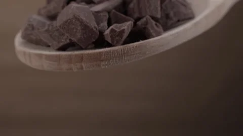 Dark Chocolate Chunks on a Wooden Spoon Stock Footage 288829849