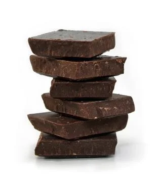 Dark chocolate cubes stack on white background 스톡 사진