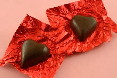 Dark chocolate hearts Stock Photos
