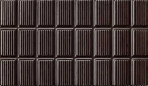 Dark chocolate rectangular tablet pattern texture wallpaper Stock Photos
