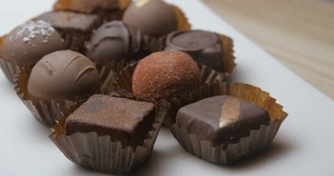 Dark chocolates rotating studio macro Stock Footage 101469440
