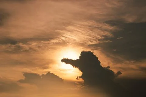 Dark cloud and light of sunset Stock Photos