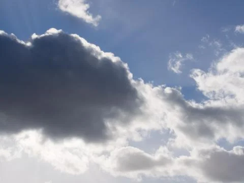 Dark cloud in front of the sun, background Photos