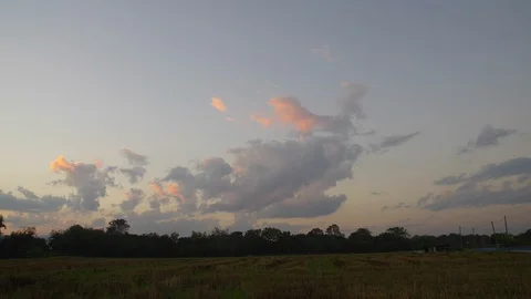 Dark cloud movement over the paddy field Stock Footage 100720288