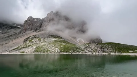 Dark cloud over Pilato lake in the Marche region Stock Footage 244653730