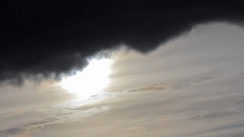Dark cloud passing through the sky  high contrast time-lapse Stock Footage 93781252