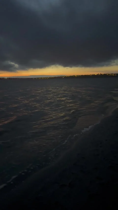 Dark Clouds Above Glowing Horizon Stock Footage 322782598