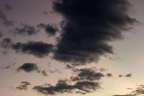 Dark Clouds Against a Dusk Sky Stock Photos