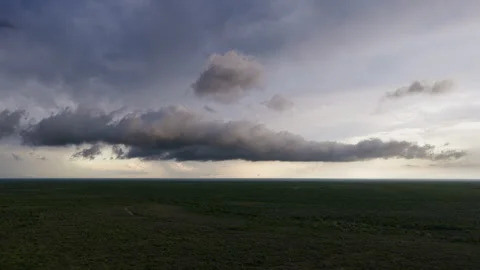 Dark clouds and beautiful evening sky landscape aerial drone 4k view Stock Footage 339505278
